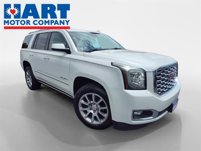 2020 GMC Yukon Denali in Summit White — front three-quarter view