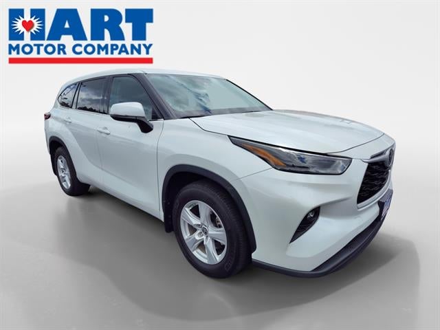 2022 Toyota Highlander LE in Wind Chill Pearl — front three-quarter view