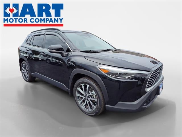 2023 Toyota Corolla Cross XLE in Jet Black — front three-quarter view