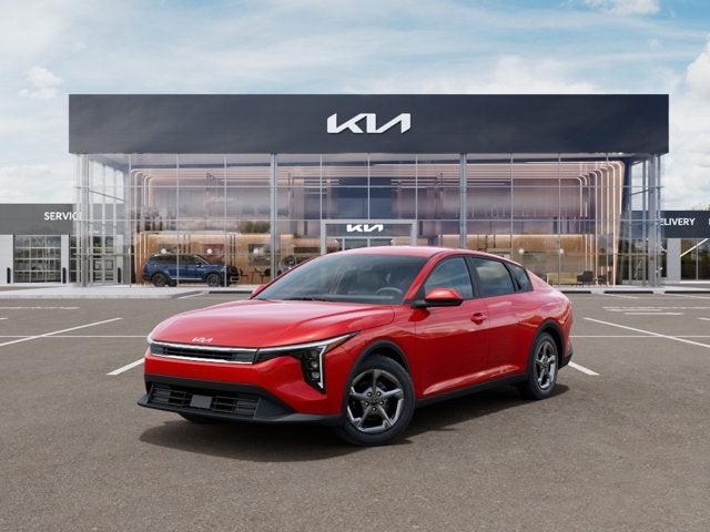 2026 Kia K4 LXS in Currant Red — front three-quarter view