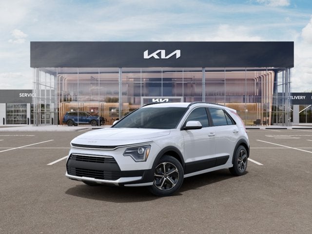 2026 Kia Niro LX in Snow White Pearl — front three-quarter view
