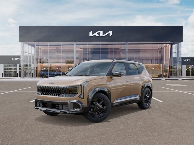 2027 Kia Seltos X-Line S in Terrain Brown — front three-quarter view