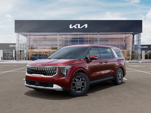 2026 Kia Carnival Hybrid EX in Flare Red — front three-quarter view