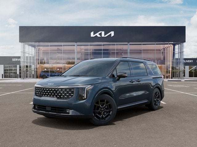 2026 Kia Carnival SX Prestige in Astra Blue — front three-quarter view